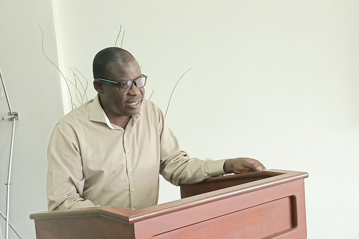 Associate Prof. Clement Okia speaking to workshop participants about gender mainstreaming and social inclusion at Muni University.