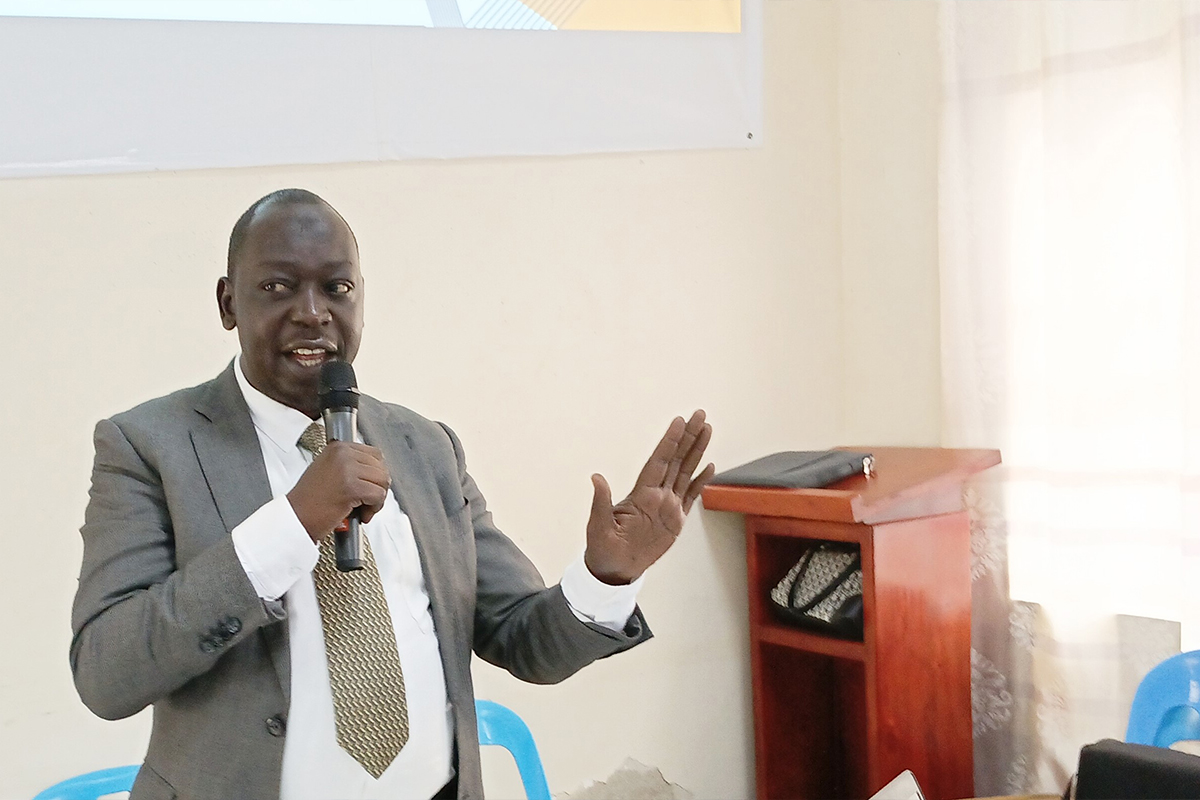 Wahid Abdul Ijosiga speaking about sports leadership, governance and talent development during a training event at Muni University.